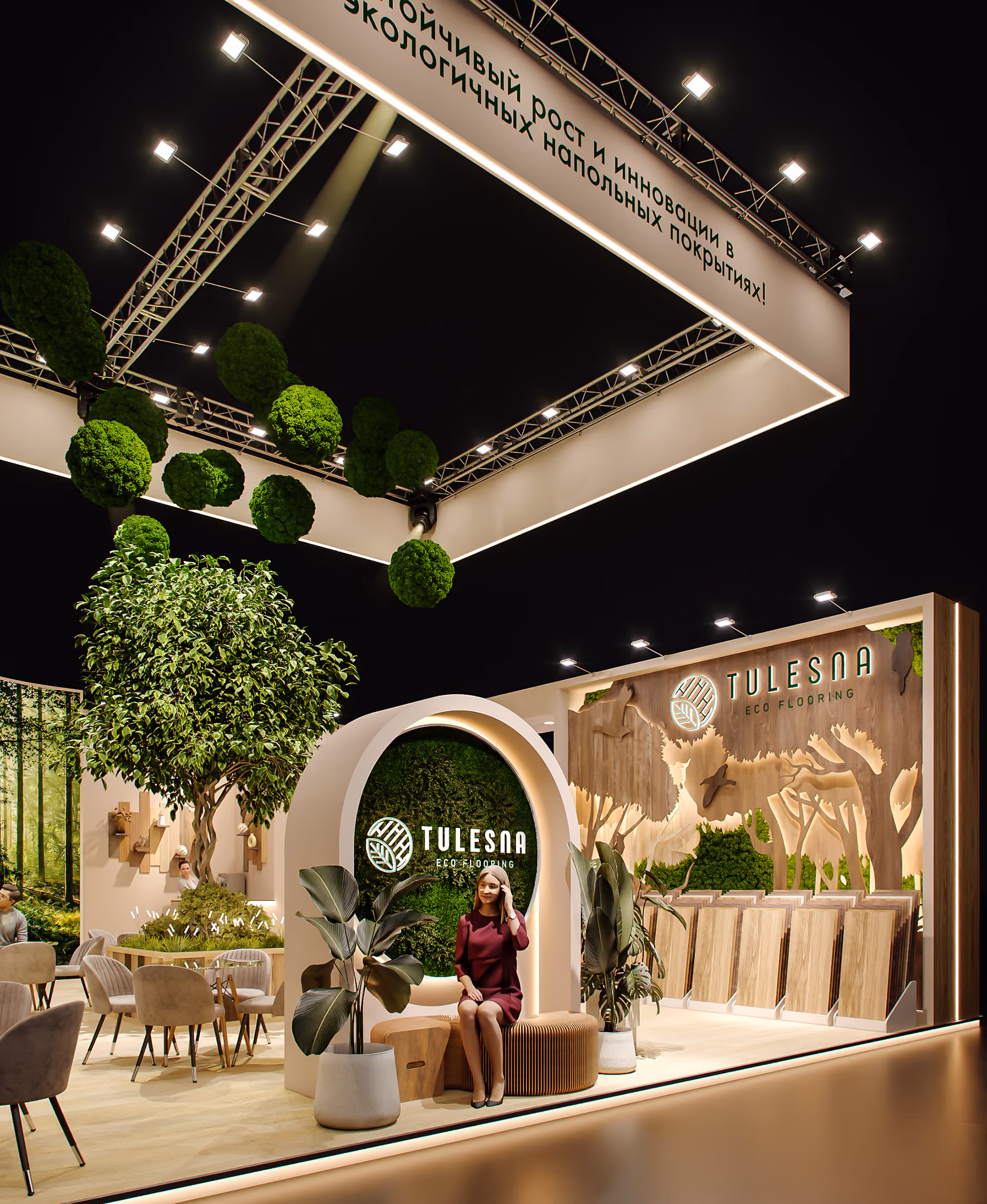 Stand da Tulesna Eco Flooring com decoração verde, madeira e mulher sentada no banco.
